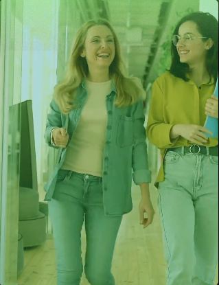 Team members walking confidently in an office corridor